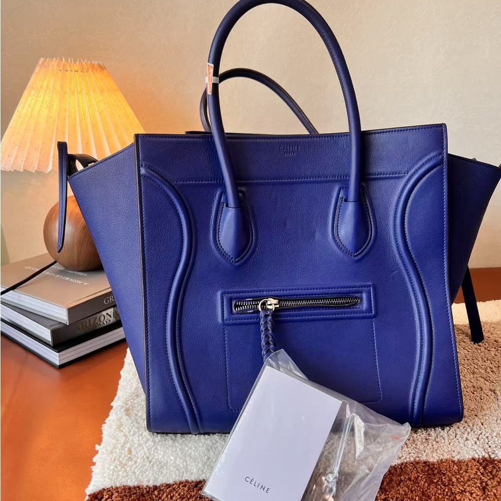 Celine swing bag, blue, （30*21*28）priced at $700, in very good condition.